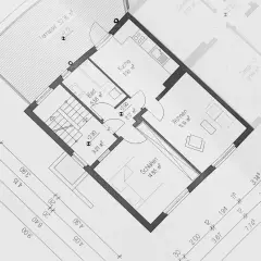 Plan parterowy bungalowu z kuchnią, łazienką, salonem i sypialnią. Widoczna duża terasa.