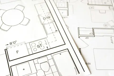 Plany architektoniczne z widocznym stołem, kuchnią (ST), łazienką (WC) i innymi pomieszczeniami. Dokumentacja do złożenia wniosku o pozwolenie na budowę.