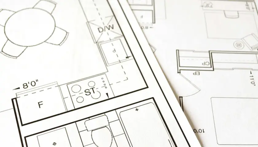 Plany architektoniczne z widocznym stołem, kuchnią (ST), łazienką (WC) i innymi pomieszczeniami. Dokumentacja do złożenia wniosku o pozwolenie na budowę.